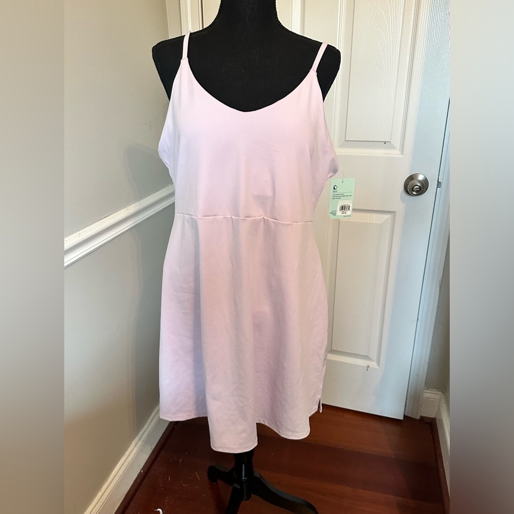 New with tags lilac two one piece with removable shorts.